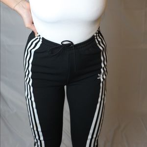 Adidas UO exclusive black 3 stripe track pants